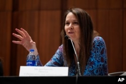 FILE - Jen Easterly, director of the U.S. Department of Homeland Security's Cybersecurity and Infrastructure Security Agency, speaks at a National Association of Secretaries of State meeting in Washington, Feb. 16, 2023.