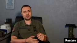 FILE - Major General Kyrylo Budanov, the head of Ukraine's defense intelligence, speaks with Reuters in Kyiv, Ukraine, as Russia's attack on Ukraine continues, June 25, 2022. Budanov says Russia is trying to buy weapons for its invasion of Ukraine anywhere it can get them.