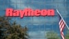 FILE - An American flag flies in front of the facade of Raytheon's Integrated Defense Systems facility in Woburn, Massachusetts, June 10, 2019. Three of the company's subsidiaries were announced on Jan. 2, 2025, as being among those sanctioned by China.