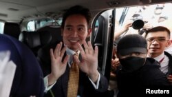 Former Move Forward Party leader Pita Limjaroenrat reacts on the day Thailand's Constitutional Court delivers its verdict on his media shareholding case, in Bangkok, Jan. 24, 2024. 