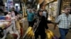 People shop at the old main bazaar of Tehran, Iran, April 24, 2024. 