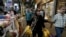 People shop at the old main bazaar of Tehran, Iran, April 24, 2024. 