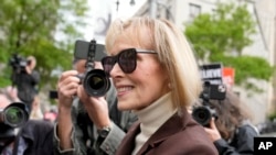 FILE - E. Jean Carroll, who alleged Donald Trump raped her in a department store in 1996, arrives at Manhattan Federal Court in New York, May 9, 2023. A jury awarded $5 million on her claim that he sexually assaulted her in the mid-1990s and then defamed her by calling the encounter a hoax.