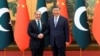 Chinese President Xi Jinping, right, and Pakistani Prime Minister Shehbaz Sharif shake hands at the Great Hall of the People in Beijing, China, June 7, 2024.
