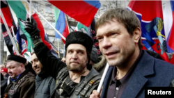 FILE - Russia-supporting Ukrainian entrepreneur Oleg Tsaryov, right, is shown in Russian-controlled Donetsk in an image taken from undated video. Tsaryov was shot and seriously wounded on Oct. 26, 2023.