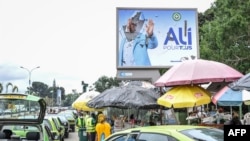 A torn campaign billboard of ousted Gabon President Ali Bongo Ondimba is seen in Libreville, Sept. 1, 2023. 