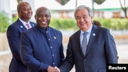 Burundi President Evariste Ndayishimiye greets U.N. Secretary-General Antonio Guterres ahead of the 11th Summit of the Regional Oversight Mechanism of Addis-Ababa Framework Agreement, in Bujumbura, Burundi, May 6, 2023. 