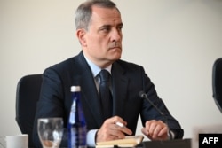 Azerbaijani Foreign Minister Jeyhun Bayramov looks on during the bilateral peace negotiation closing session with Armenia, in Arlington, Virginia, May 4, 2023.