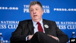 FILE - Paul Beckett, then Wall Street Journal Washington bureau chief, speaks about the Russian government's ongoing detention of Journal reporter Evan Gershkovich during a news conference, July 13, 2023, at the National Press Club in Washington.