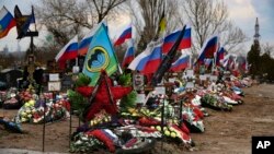 Graves of Russian servicemen killed in Ukraine in a cemetery in Russia’s Volgograd region on March 30, 2024.