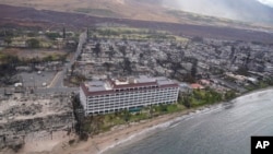 Wildfire wreckage is seen Aug. 10, 2023, in Lahaina, Hawaii. The search of the wildfire wreckage on the Hawaiian island of Maui on Thursday revealed a wasteland of burned-out homes and obliterated communities.