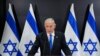 FILE - Israeli Prime Minister Benjamin Netanyahu speaks to the media during a press conference, in Tel Aviv, Israel, April 10, 2023.