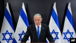 FILE - Israeli Prime Minister Benjamin Netanyahu speaks to the media during a press conference, in Tel Aviv, Israel, April 10, 2023.