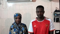 Morwan Mohammad and his wife, Nagad Daoud Abdallah, who fled war in Sudan, are pictured in their room at a shelter for refugees, in Batam, Indonesia, May 16, 2024. They are among hundreds of refugees waiting for resettlement in a third country.