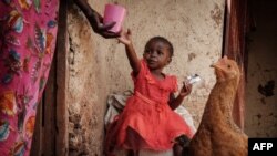 FILE - Faith, 3, who completed doses through the world's first malaria vaccine (RTS, S) pilot program, at home in Kenya on March 7, 2023. Ghana has become the first country to approve a new malaria vaccine described as a "world changer" by the scientists who developed it.