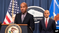 FILE - Under Secretary of the Treasury for Terrorism and Financial Intelligence Brian Nelson, with U.S. Attorney Matthew Graves for the District of Columbia, speaks during a news conference at the Department of Justice in Washington, April 25, 2023.