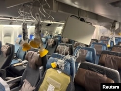 The interior of Singapore Airline flight SQ321 is pictured after an emergency landing at Bangkok's Suvarnabhumi International Airport, Thailand, May 21, 2024.