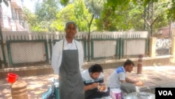Roadside food vendor Atma Prakash Singh in New Delhi says standing on the hot road in the sizzling summer is a problem. (Anjana Pasricha/VOA)