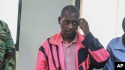 FILE - Preacher Paul Mackenzie arrested two weeks ago for asking his followers to starve to death in order to meet Jesus, appears in court in Malindi, Kenya, May 2, 2023.