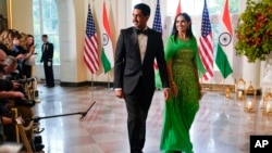 Rep. Ro Khanna, D-Calif., and his wife, Rita Khanna, arrive for the state dinner with President Joe Biden and India's Prime Minister Narendra Modi at the White House, June 22, 2023, in Washington.