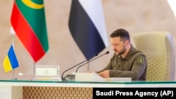 FILE - In this photo provided by Saudi Press Agency, SPA, Ukraine's President Volodymyr Zelenskyy speaks during the Arab summit in Jeddah, Saudi Arabia, May 19, 2023. Saudi Arabia is hosting of talks, Aug. 8, 2023, aimed at finding a peaceful settlement to the war in Ukraine.