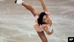 FILE - Kristi Yamaguchi skates at the U.S. Olympic Festival in Oklahoma City, Oklahoma, July 24, 1989. At the 1992 Winter Olympics, she became the first Asian American to win an individual figure skating gold medal.