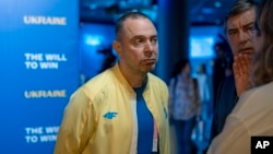 Vadym Guttsait, Ukraine's Olympic chief, talks to people ahead of the opening of the Ukraine house, at the 2024 Summer Olympics in Paris, France, July 27, 2024.