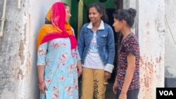 Manju Ranga says her two daughters should get support to pursue diplomas and college degrees. (Anjana Pasricha/VOA)