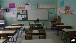 An empty classroom in a closed public school is seen in Beirut, Lebanon, March 2, 2023. Public schools have been open for fewer than 50 days this school year because teachers are on strike.