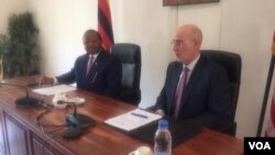 UMnu. Frederick Shava loAmbassador Robert Scott