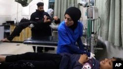 Palestinian medics treat those wounded in the Israeli bombardment of the Gaza Strip at the Kuwaiti Hospital in Rafah refugee camp, southern Gaza Strip, May 3, 2024. 