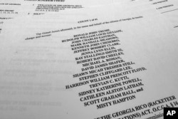 The indictment in Georgia against former President Donald Trump is photographed, Aug. 14, 2023.