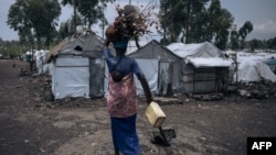 ces deux femmes avaient été tuées parce qu'accusées par une partie de la population de pratiquer la sorcellerie et "d'être derrière le décès de plusieurs personnes" de la communauté. (Photo by ALEXIS HUGUET / AFP)