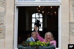 U.S. WWII veteran Harold Terens, 100, left, and Jeanne Swerlin, 96, celebrate their wedding in Normandy, France, June 8, 2024.