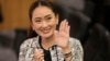 Leader of Pheu Thai Party, Paetongtarn Shinawatra, daughter of Thailand's former Prime Minister Thaksin Shinawatra, waves before press conference in Bangkok, Thailand, Aug. 15, 2024.