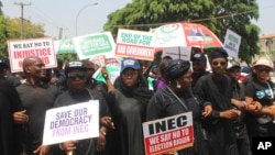 Supporters of Atiku Abubakar of the People's Democratic Party, attend a protest against the recent presidential election results, in Abuja, Nigeria, March 6, 2023.