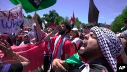 Pro-Palestinian protesters demonstrate in front of the White House in Washington, June 8, 2024. 