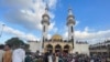 Demonstrators take part in protest outside of the Al Sahaba Mosque against the government, in the aftermath of the floods in Derna, Libya, Sept. 18, 2023. 