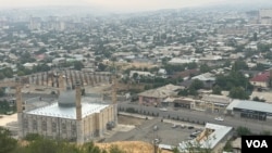 FILE - In Osh, Kyrgyzstan, shown here on Sept. 1, 2023, China’s economic influence is so strong that it is common for residents to label any new infrastructure projects “Chinese.” Previously deferred debt repayments to China are coming due in Kyrgyzstan