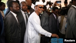 FILE - Chadian President Mahamat Idriss Deby casts his vote for the presidential elections in N’Djamena, Chad, May 6, 2024.