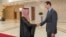 FILE - In this photo released by the Syrian official news agency SANA, Syrian President Bashar Assad, right, welcomes Saudi Minster of Foreign Affairs Faisal bin Farhan, left, ahead of their meeting in Damascus, Syria, April 18, 2023.