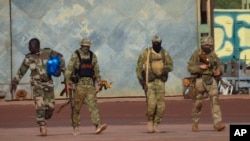 FILE - This undated photograph shows Russian Wagner Group mercenaries in northern Mali. (French Army via AP)