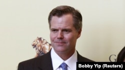 FILE - Former Co-chairperson and Executive Director Jim Murren attending MGM China's investors IPO roadshow in Hong Kong May 17, 2011.