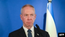 FILE - Israeli Defense Minister Yoav Gallant delivers a statement to the press in Tel Aviv, March 9, 2023.