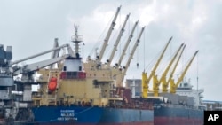 FILE - The Eaubonne bulk carrier ship docks in the port of Mombasa, Kenya Saturday, Nov. 26, 2022, with 53,300 tons of wheat procured under the Black Sea Grain Initiative.
