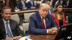 Former President Donald Trump appears in court for a civil fraud case at a Manhattan courthouse, in New York, Oct. 3, 2023.