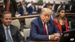 FILE - Former President Donald Trump appears in court for a civil fraud case at a Manhattan courthouse, in New York, Oct. 3, 2023.