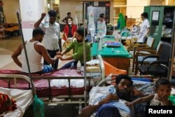 Dengue-infected people are hospitalized for treatment at Mugda Medical College and Hospital, as the yearly death toll from the disease has surpassed the previous record in the country, in Dhaka, Bangladesh, Sept. 5, 2023.