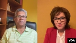 Press Trust of India correspondent Harinder Mishra, left, speaks with Nazrana Ghaffar Yousafzai of VOA's Afghan Service.