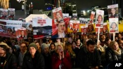 People attend a demonstration demanding the release of the hostages taken by Hamas militants during their Oct. 7 attack, in Tel Aviv, Israel, Jan. 27, 2024.